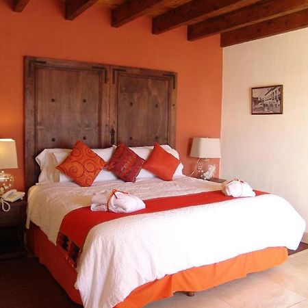 Casa Del Tio Hotel Boutique Σαν Μιγκέλ ντε Αγιέντε Δωμάτιο φωτογραφία A bedroom at Hotel San Cristóbal
