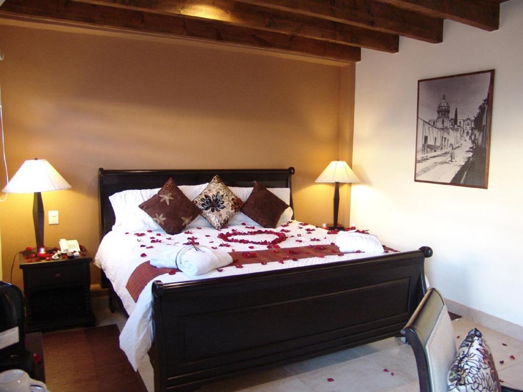 Casa Del Tio Hotel Boutique Σαν Μιγκέλ ντε Αγιέντε Δωμάτιο φωτογραφία A bedroom at the Inn at the Quinta Real