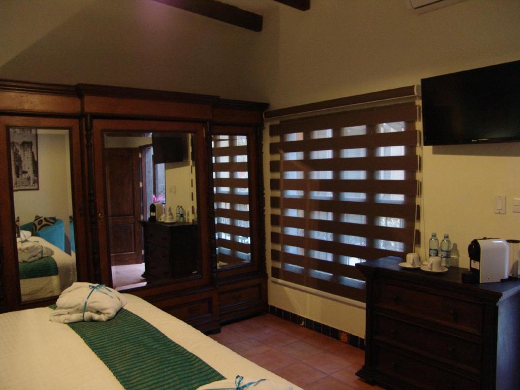 Casa Del Tio Hotel Boutique Σαν Μιγκέλ ντε Αγιέντε Δωμάτιο φωτογραφία A room at the resort